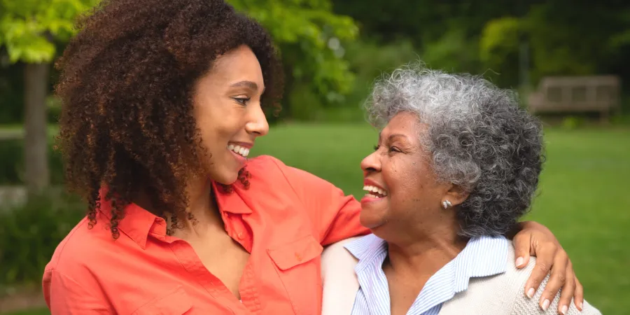 mother and daughter smiling