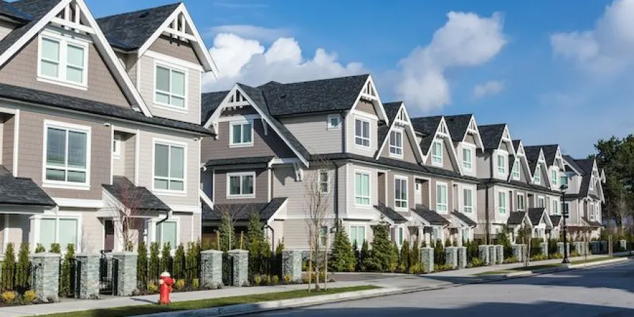 a close up of a street in front of a house