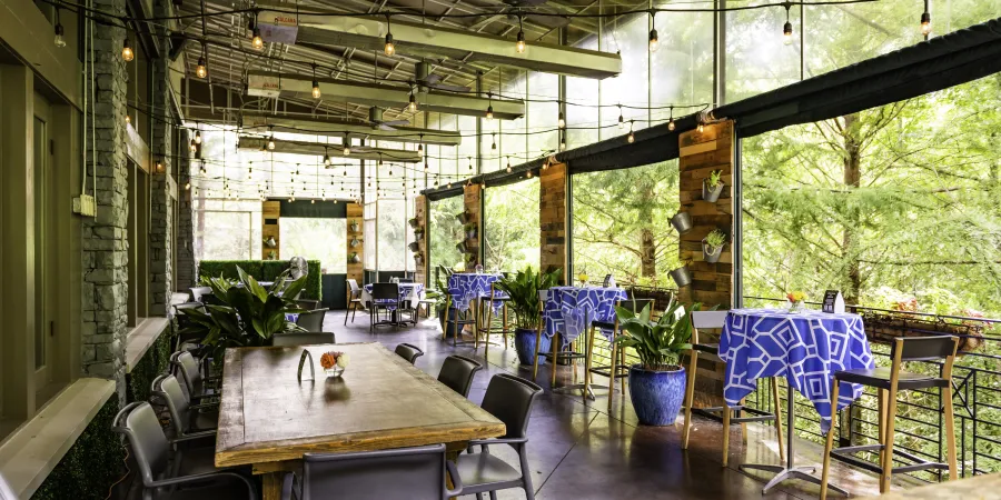 a dining room table in front of a building