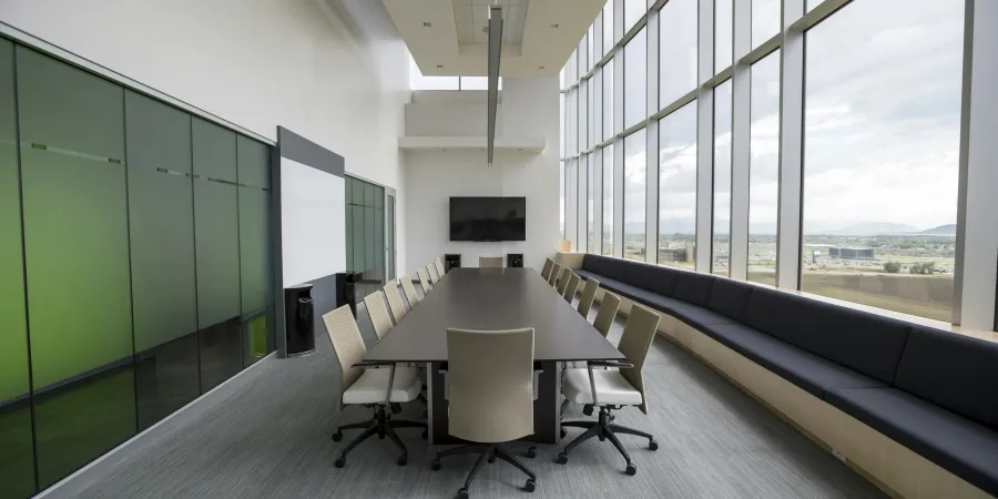 a room with a table and chairs