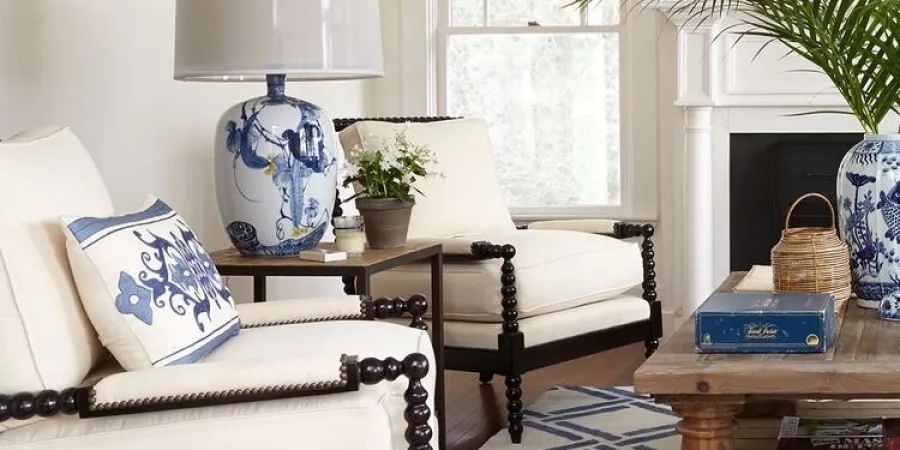 a living room filled with furniture and a rug