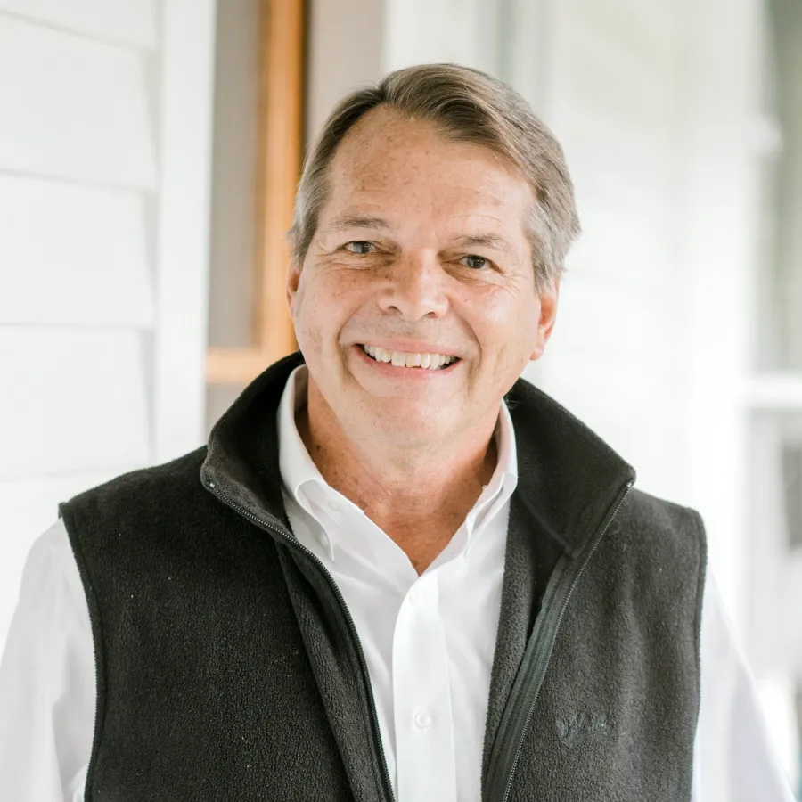 a man smiling for the camera