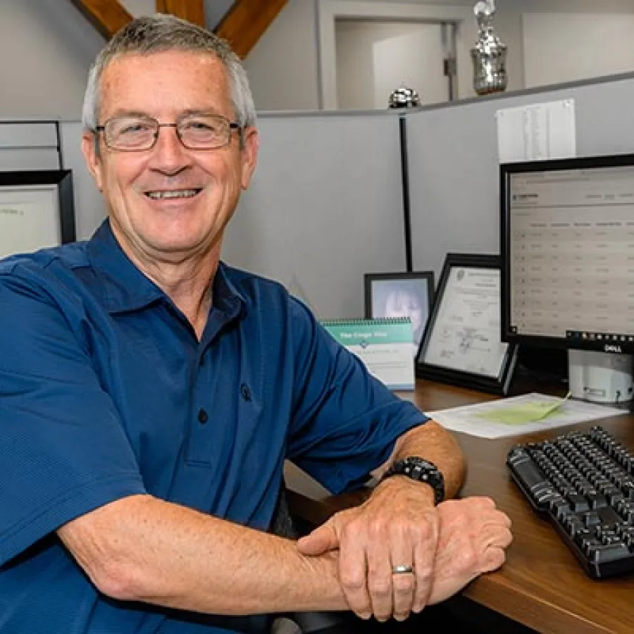 a man sitting at a desk