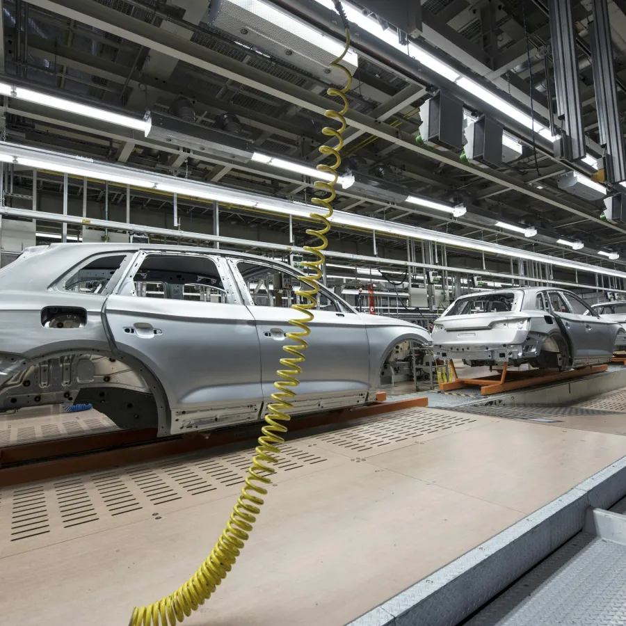 a car showroom with cars
