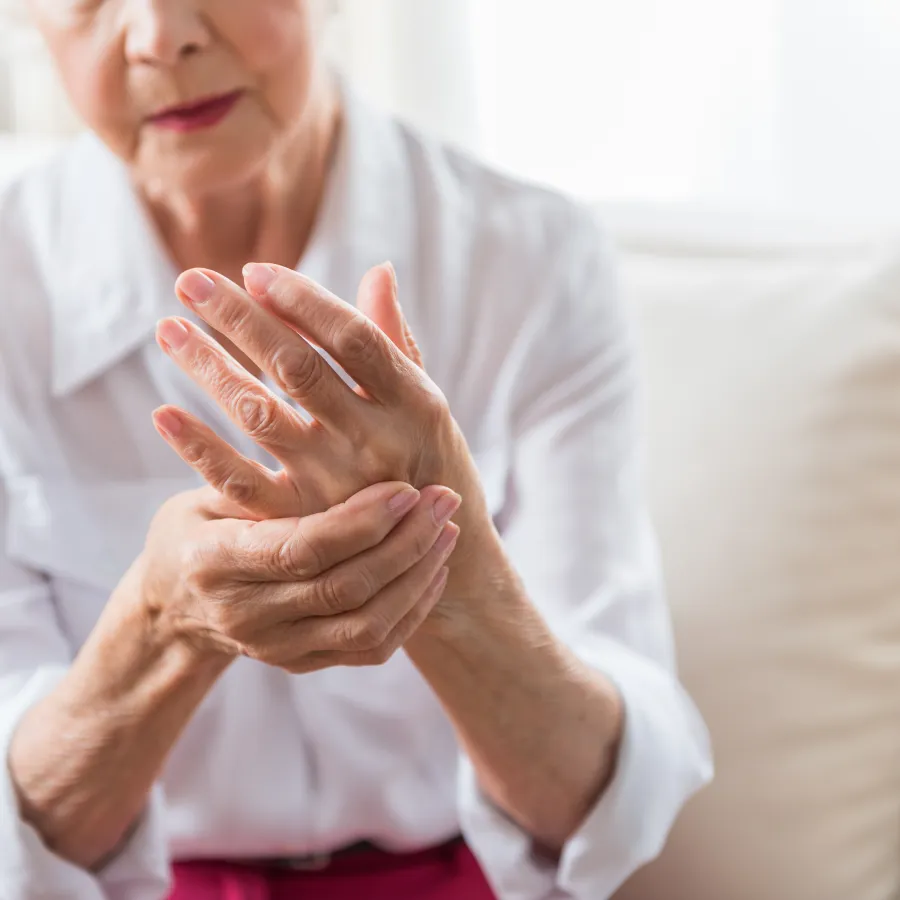 a woman holding her hands together