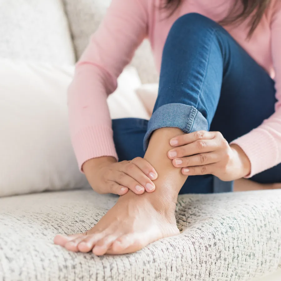 a woman sitting on a couch