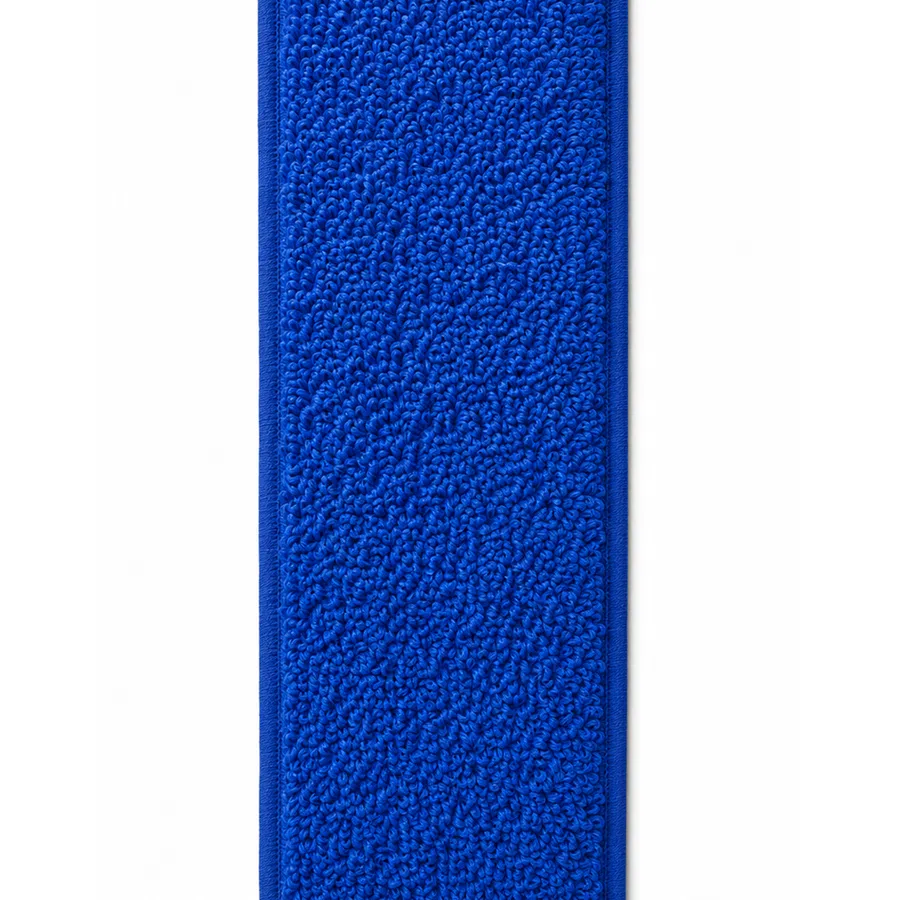 Close-up of a rectangular blue microfiber cleaning cloth with textured loops and stitched edges on white background