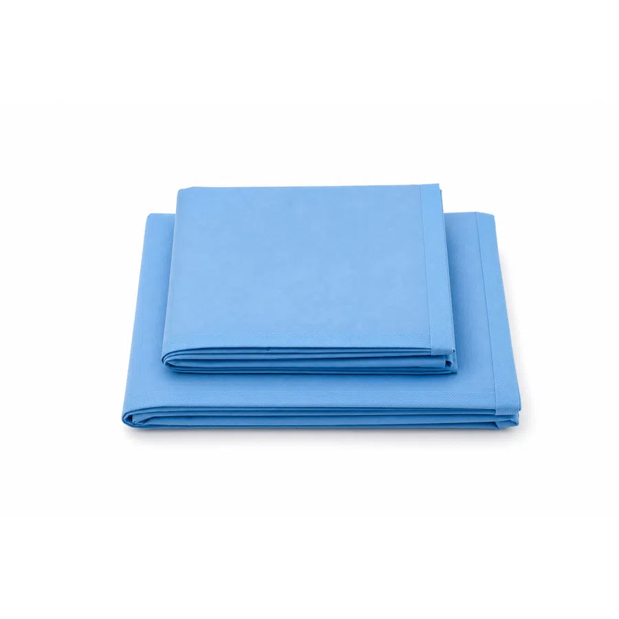 Two neatly folded blue microfiber cleaning cloths stacked on white background.
