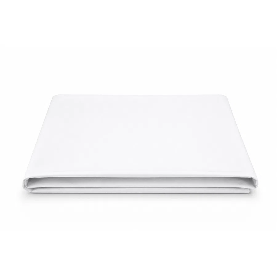 Neatly folded white bed sheet on a white background highlighting smooth fabric texture and clean edges