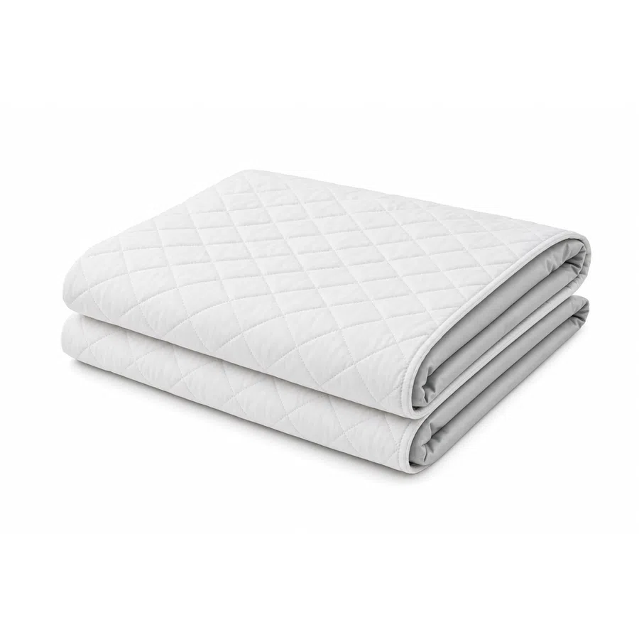 Blue quilted rectangular mat with rounded corners and a folded corner showing light green underside.