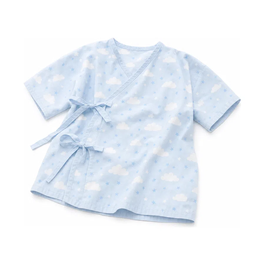 Light blue baby kimono shirt with white clouds and stars pattern, featuring side ties for fastening.