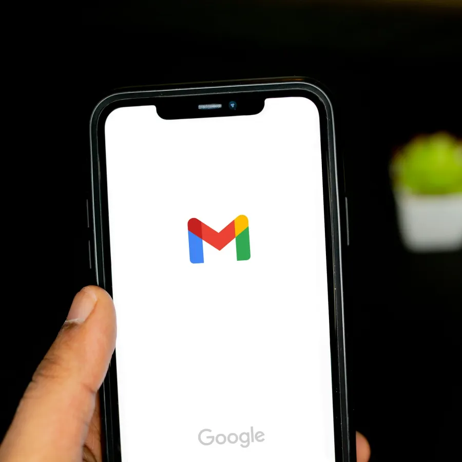 a hand holding a cell phone
