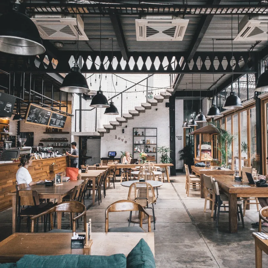 a restaurant with tables and chairs