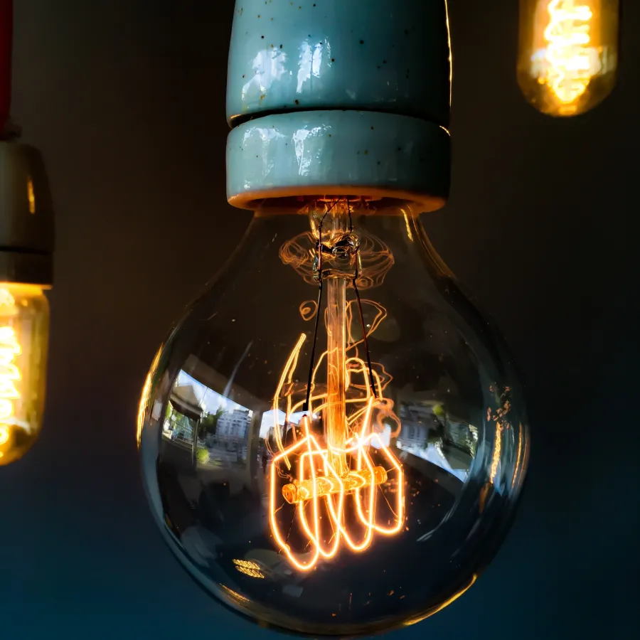 a light bulb with a blue light