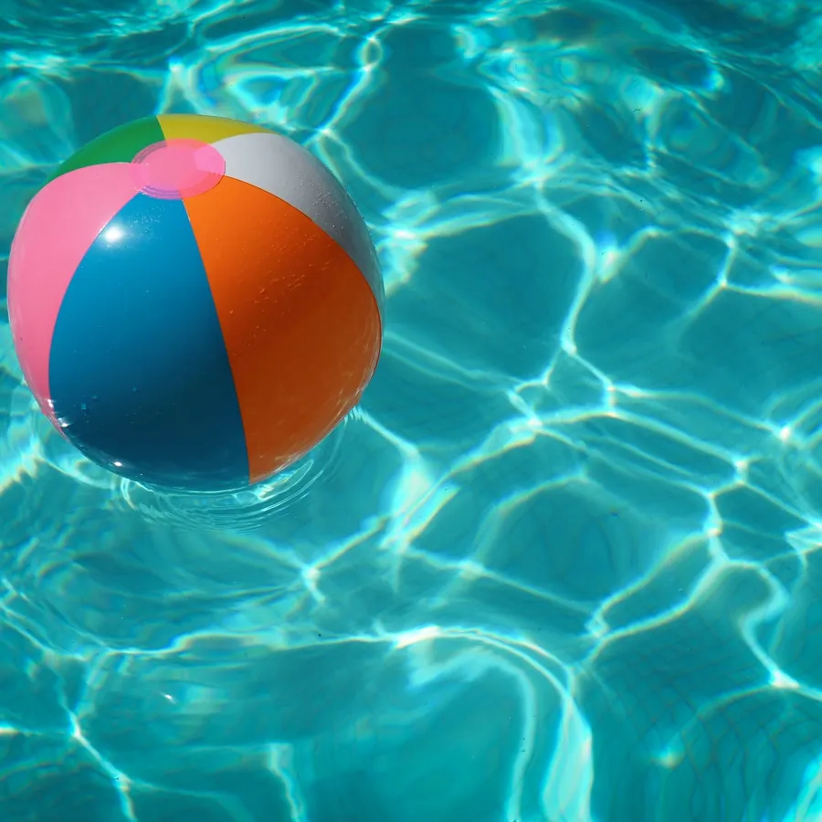 a colorful ball floating in water