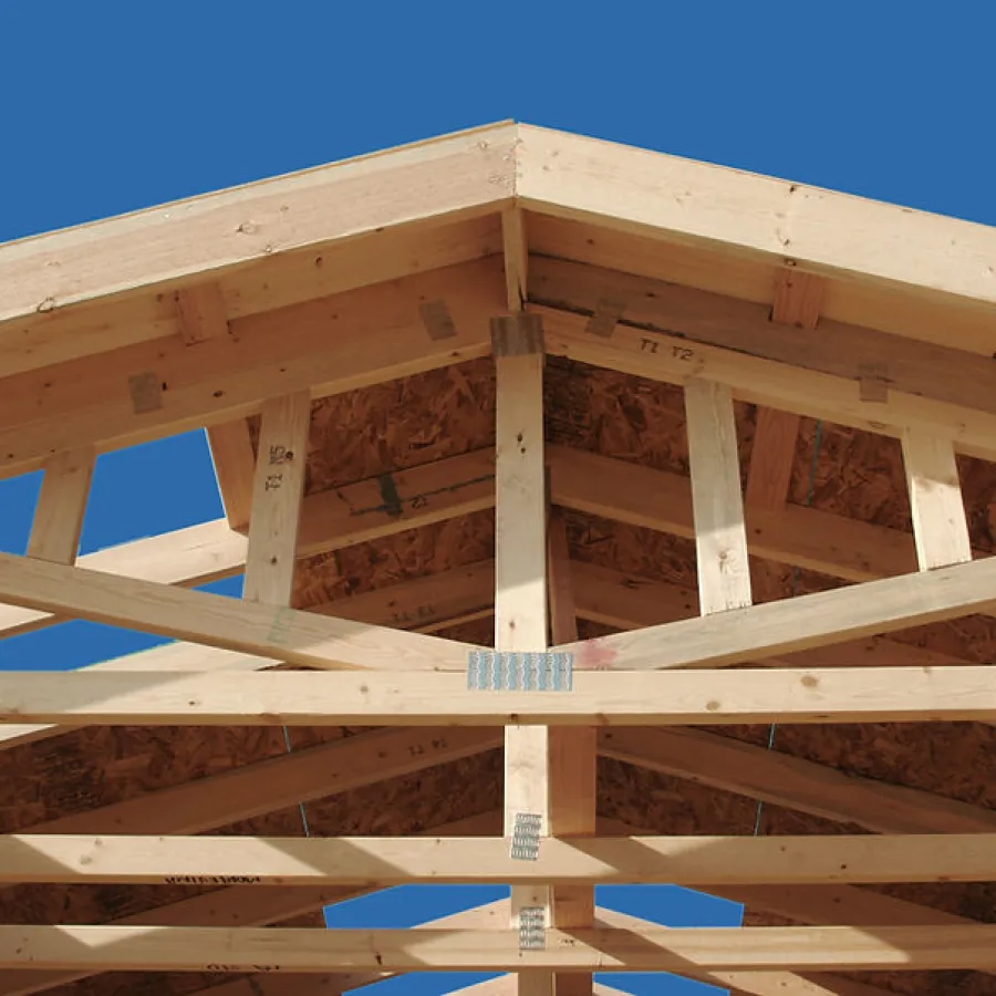 a wooden structure with a sign