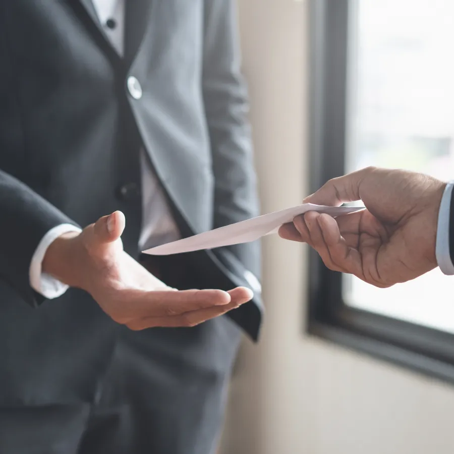 a person holding a paper