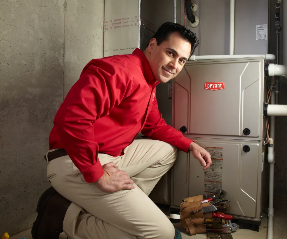 HVAC Technician installing a New Residential HVAC Unit