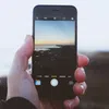 a person holding a cell phone