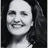 a woman smiling for the camera