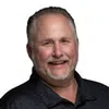 a man smiling for the camera