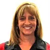 a close-up of a woman smiling