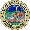 a round sign with a house and a horse drawn carriage