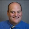 a man smiling for the camera
