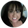 a woman smiling for the camera