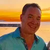 a man smiling for the camera