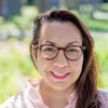 a woman wearing glasses