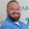 a man smiling for the camera