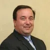 a man smiling for the camera