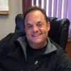 a man smiling for the camera