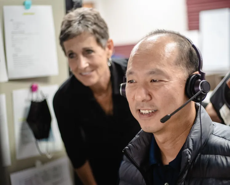 a man and woman smiling