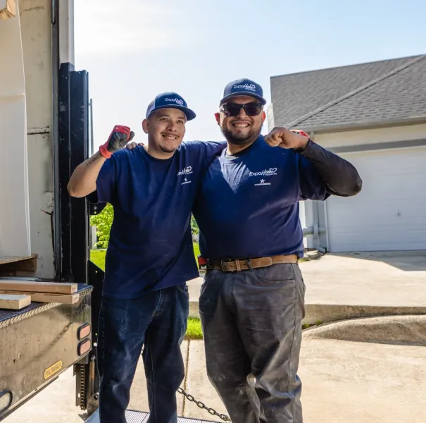 a couple of men holding objects