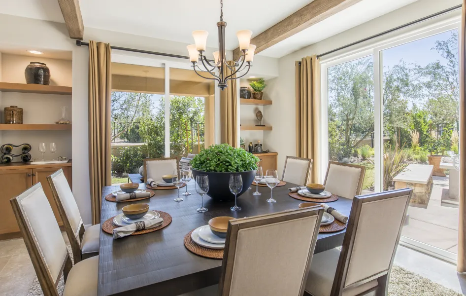 a dining room with a large window