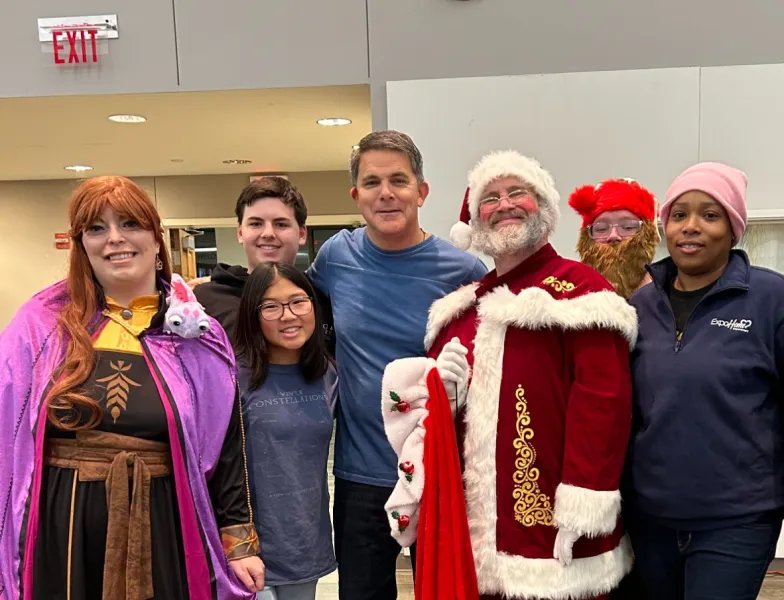a group of people posing for a photo