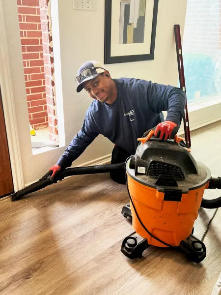 a man using a lawn mower