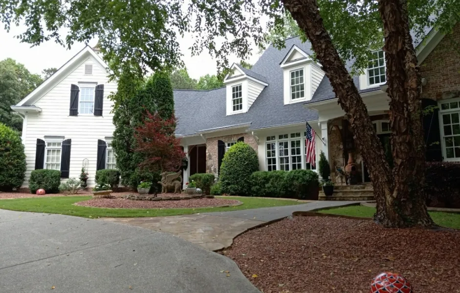 a house with a flag on the front