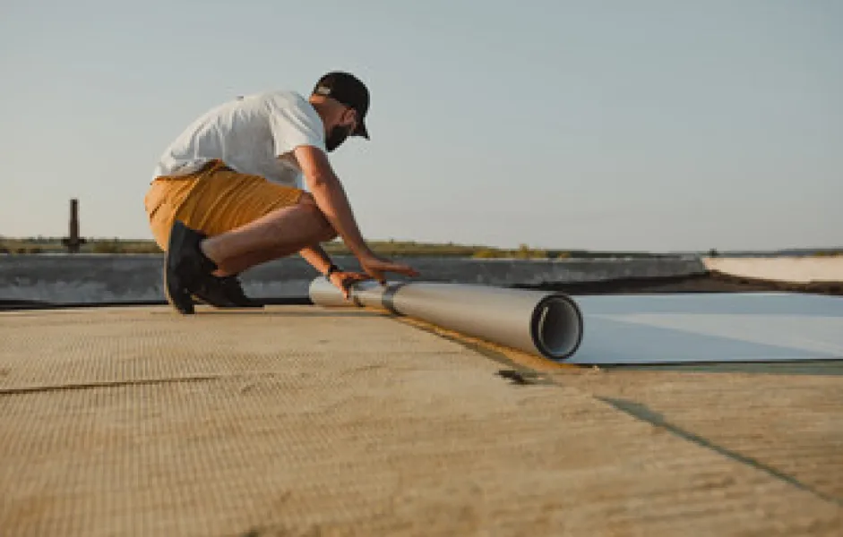 a man working on a pipe