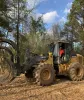 a person driving a tractor