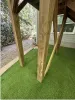 a wooden structure in a yard