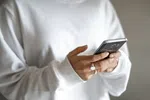 a man holding a cell phone