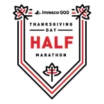 Invesco QQQ Thanksgiving Day Half Marathon logo with red and black maple leaf design and bold text.