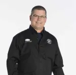 a man in a black jacket