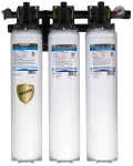 Three-stage water filtration system with Defender pre-filter and Silver Plus HC cartridges for sediment and chlorine removal.