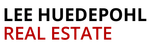 Real estate text in bold red and black with a house roof silhouette icon above the words.