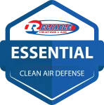Reliable Heating & Air Essential Clean Air Defense badge in blue and red colors with house shape.