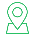 Green location pin icon above a simplified map outline on a transparent background